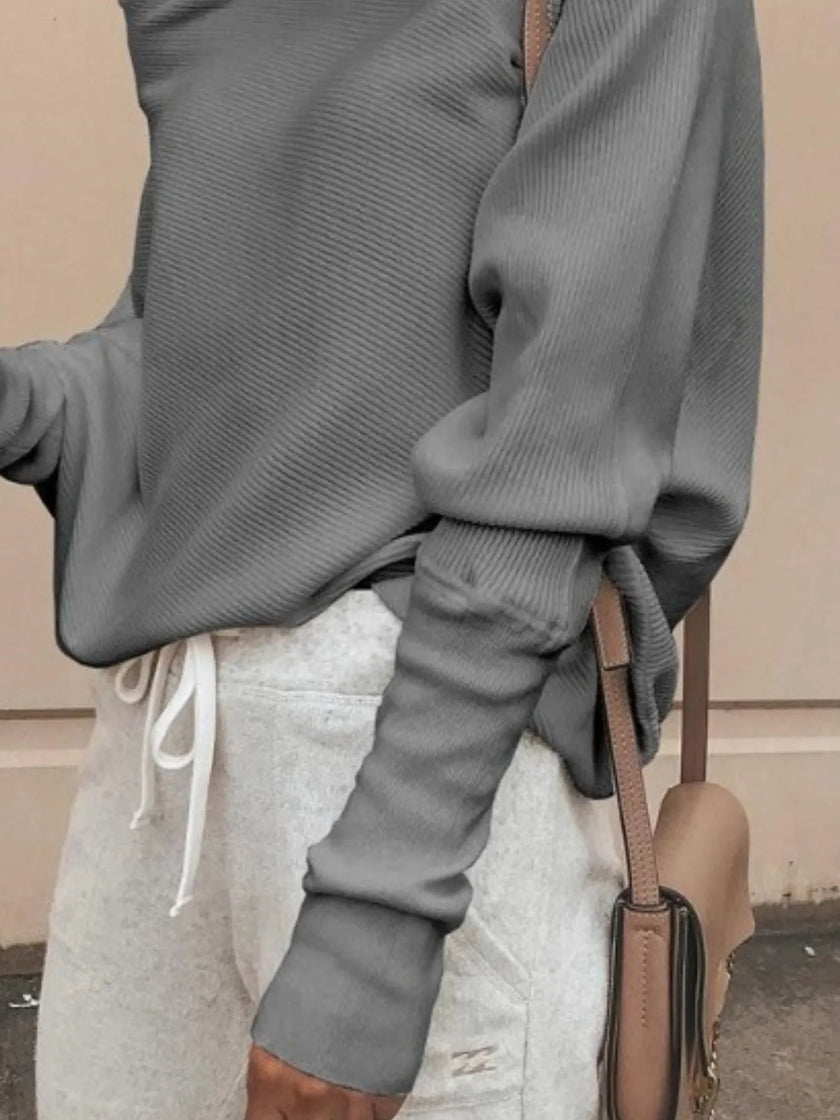 Oversized ribbed knit top with loose fit and breathable fabric