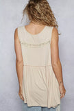 Feminine lace babydoll top with subtle ruffles and soft silhouette