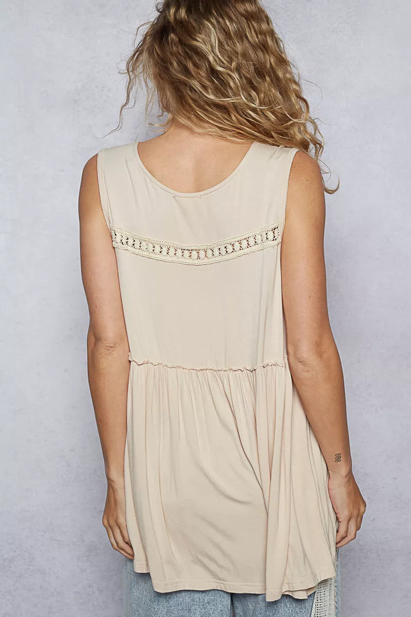 Feminine lace babydoll top with subtle ruffles and soft silhouette