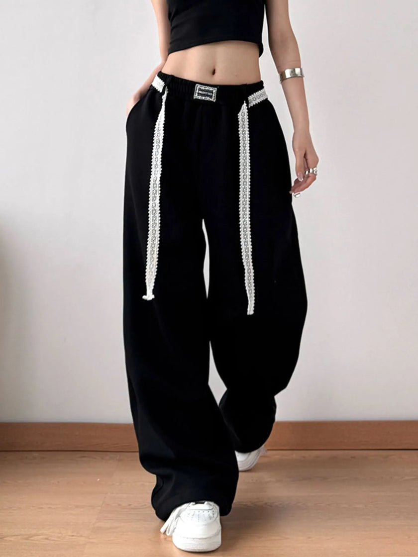 Front view of wide-leg pants with visible pocket design