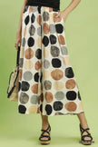 Women's cream wide leg flowy trousers with brown black and grey dot print