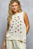 Cream knit sweater top with strawberry print, round neck, sleeveless, relaxed fit, soft texture