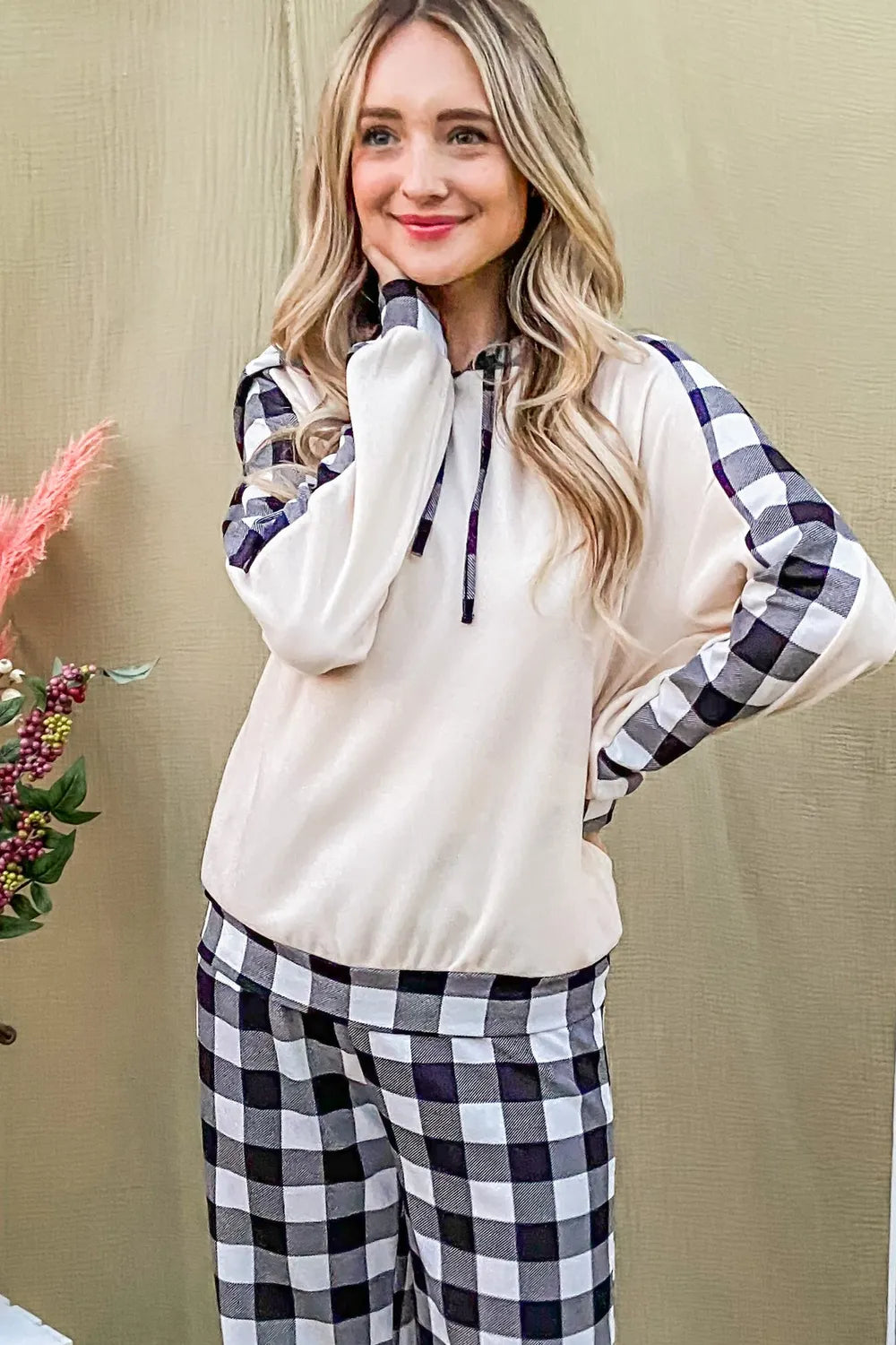 Black and white plaid lounge set featuring hooded top and drawstring pants