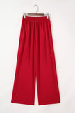 Charcoal pleated pull-on pants with clean straight legs