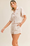 Blush pink two-piece lounge set featuring cropped top