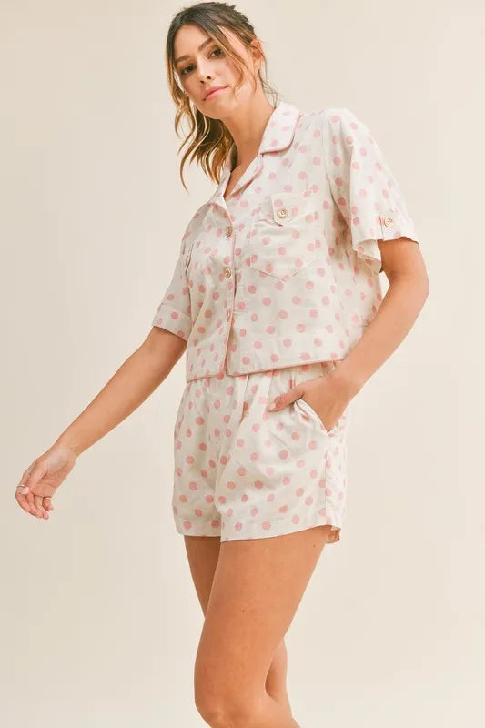 Blush pink two-piece lounge set featuring cropped top