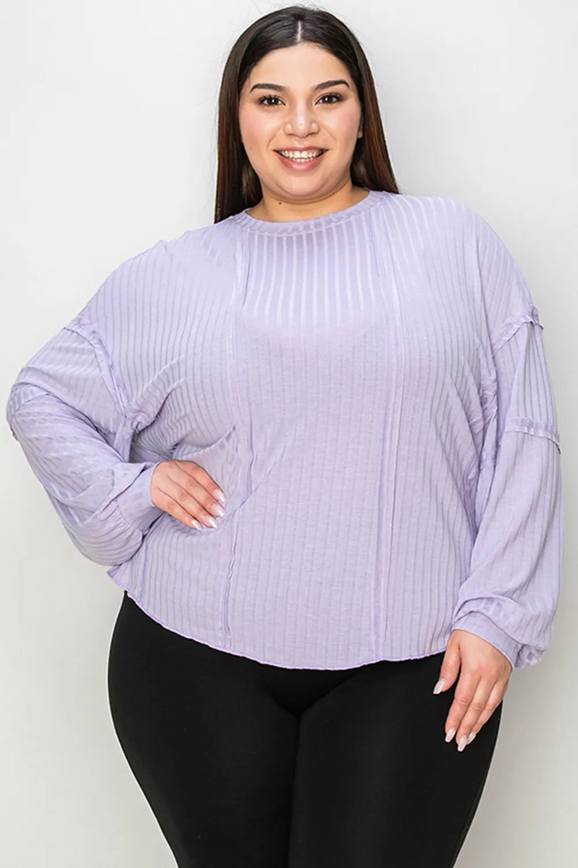 Front view of ribbed neckline on long sleeve shirt