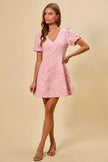 Floral jacquard mini dress with feminine flare and subtle texture