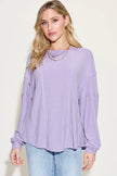 Sleeve detail showcasing moderate stretch fabric