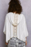 V-neck hoodie top showcasing soft fabric and stretchy design