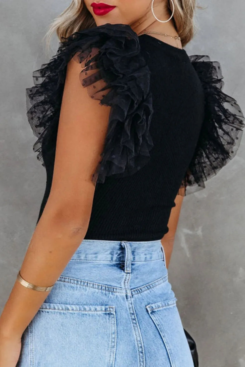 Black ruffled cap sleeve blouse with ribbed texture and fitted silhouette