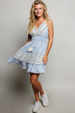 Light blue mini dress with eyelet embroidery smocked waist and lace trim details
