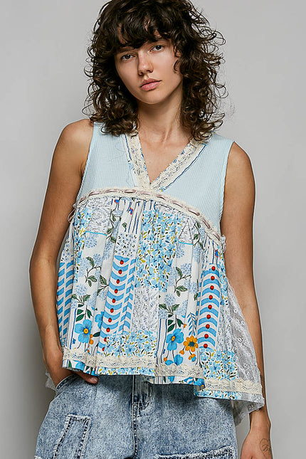 Light blue ribbed V-neck sheer tank top with floral print and lace trim