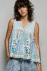 Light blue ribbed V-neck sheer tank top with floral print and lace trim