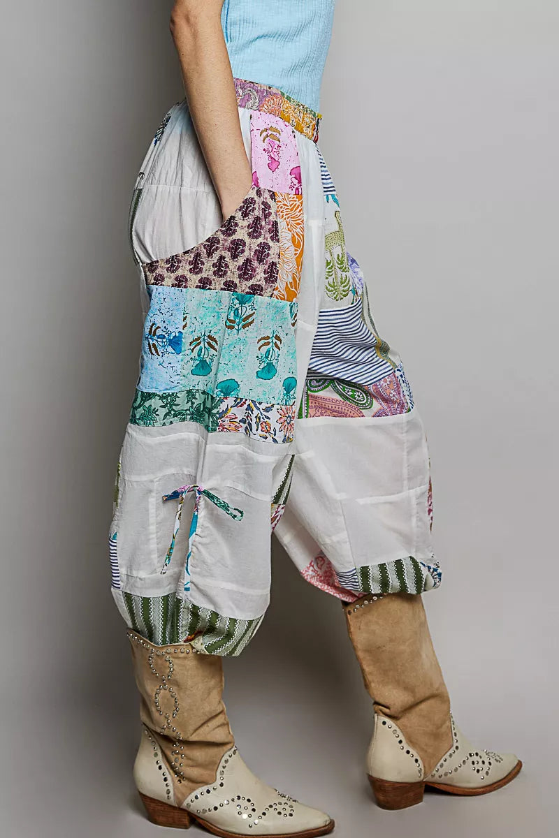 Multi colored patchwork wide leg cotton pants with adjustable side drawstring ties