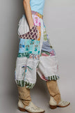 Multi colored patchwork wide leg cotton pants with adjustable side drawstring ties