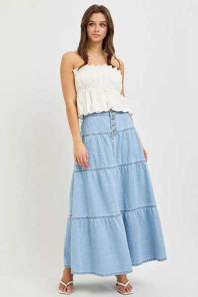 High rise light wash blue denim tiered maxi skirt with button front closure