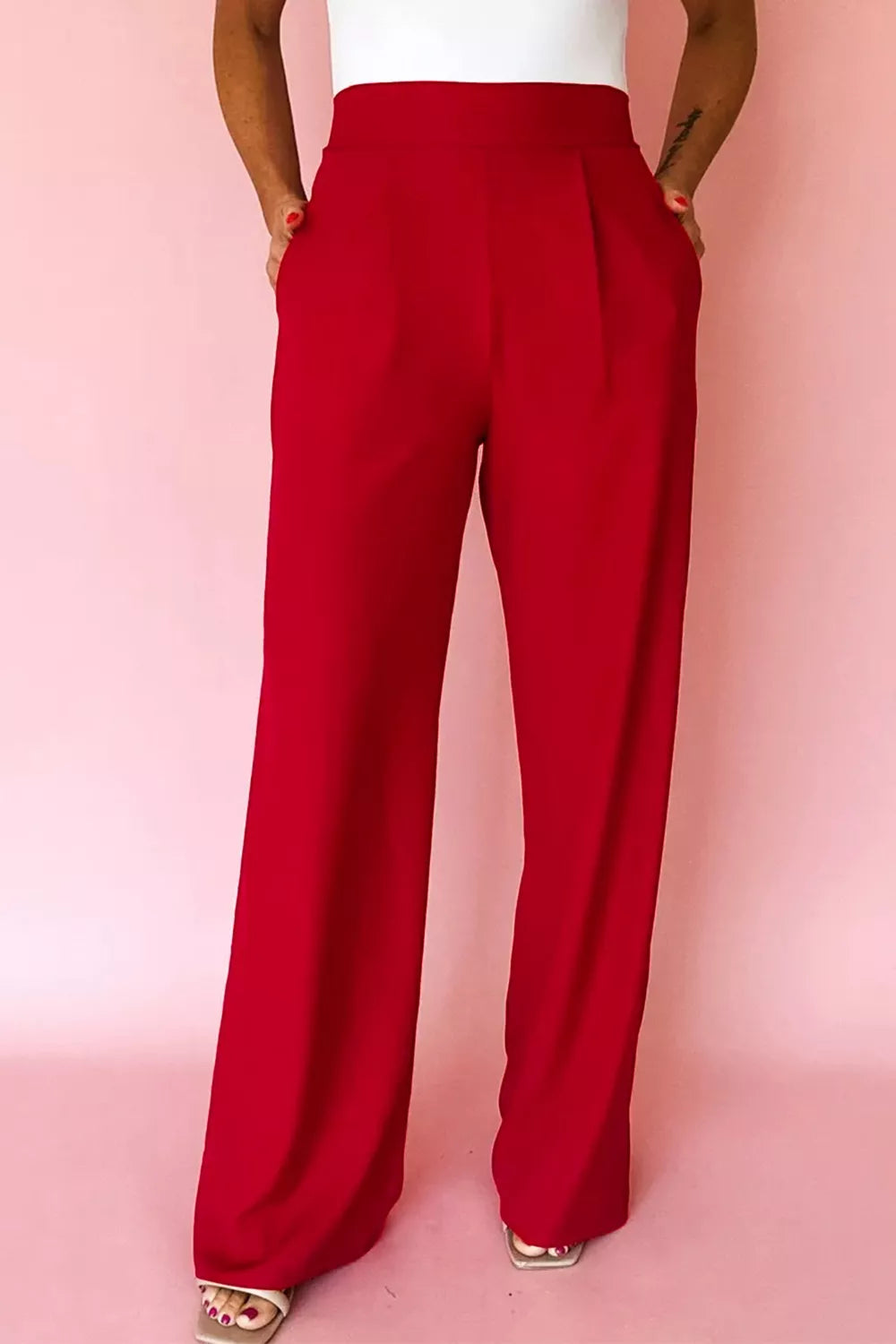 Black pleated pull-on straight leg pants with high waist