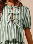 Wide-leg pants showcasing relaxed fit and subtle stripe detail