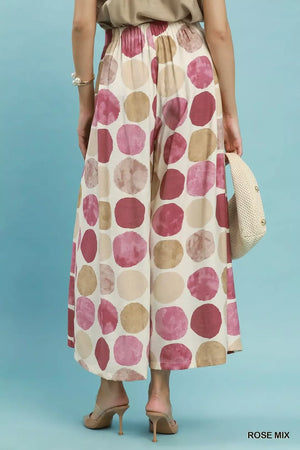 Womens wide leg flowy pants with cream base and rose mix polka dots