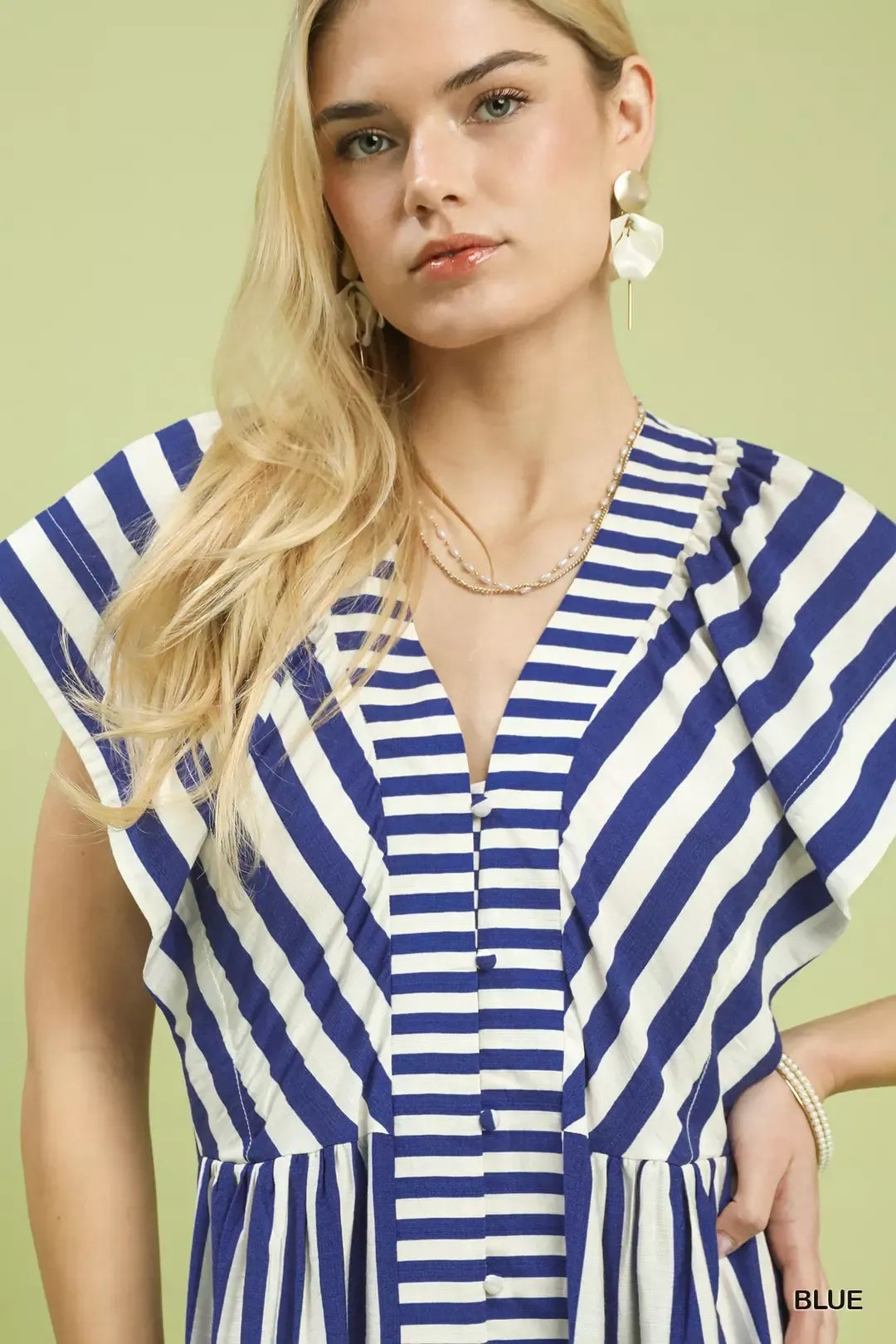 Blue-and-white striped ruffled midi dress with button-front details, chic fit, sleeveless design.