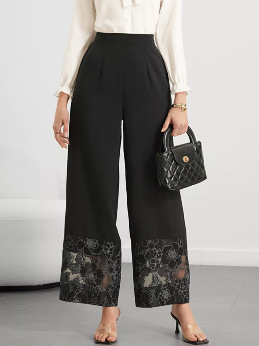 Elegant wide leg pants featuring lace hem detail