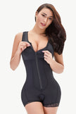 Lace trim and zipper on supportive shaping bodysuit