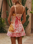Pink orange floral lace-up mini dress with ruched back and flared hem