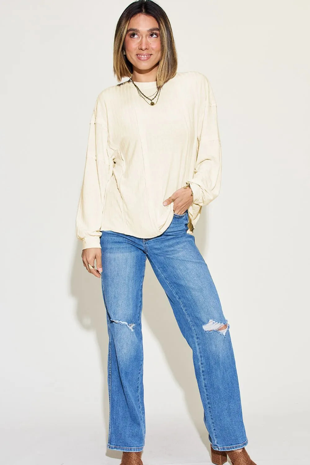 Close up of ribbed neckline and fabric texture on shirt