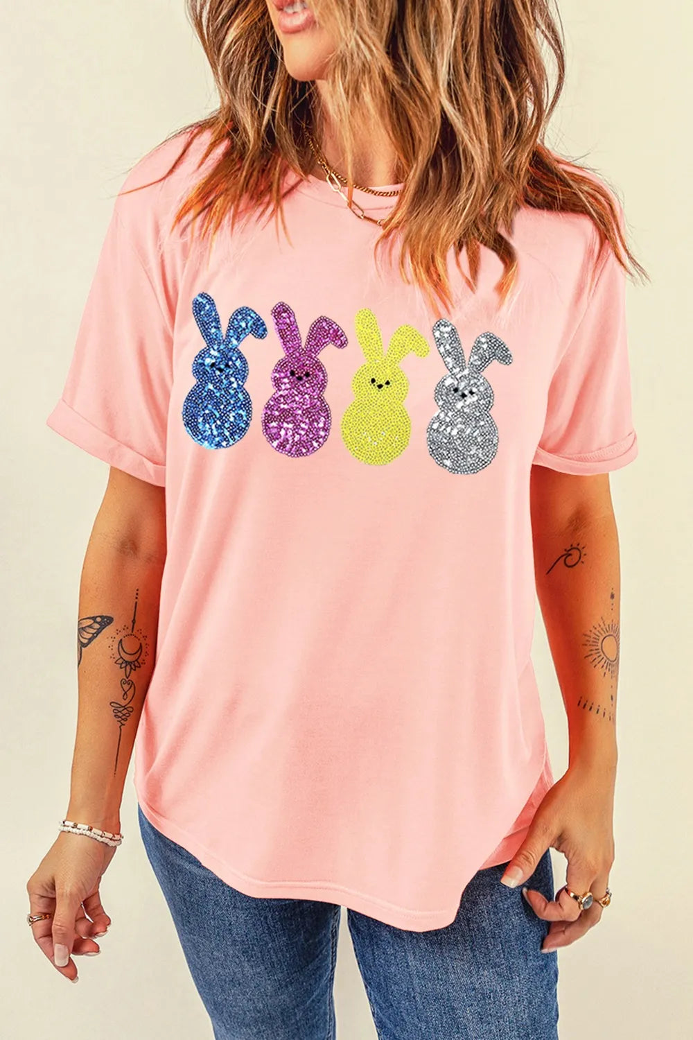 Pink sequin bunny t-shirt with vibrant colors, soft fabric, relaxed fit, festive Easter design.