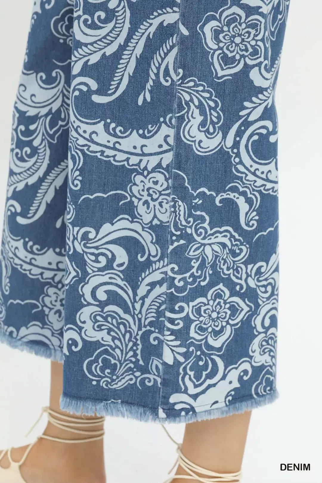 Blue stone wash denim wide leg crop pants with white floral paisley print