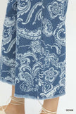 Blue stone wash denim wide leg crop pants with white floral paisley print