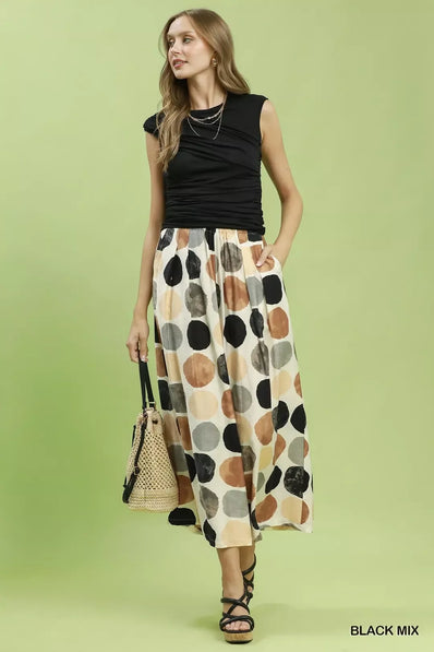 Women's wide leg flowy trousers in beige with black and brown dot print