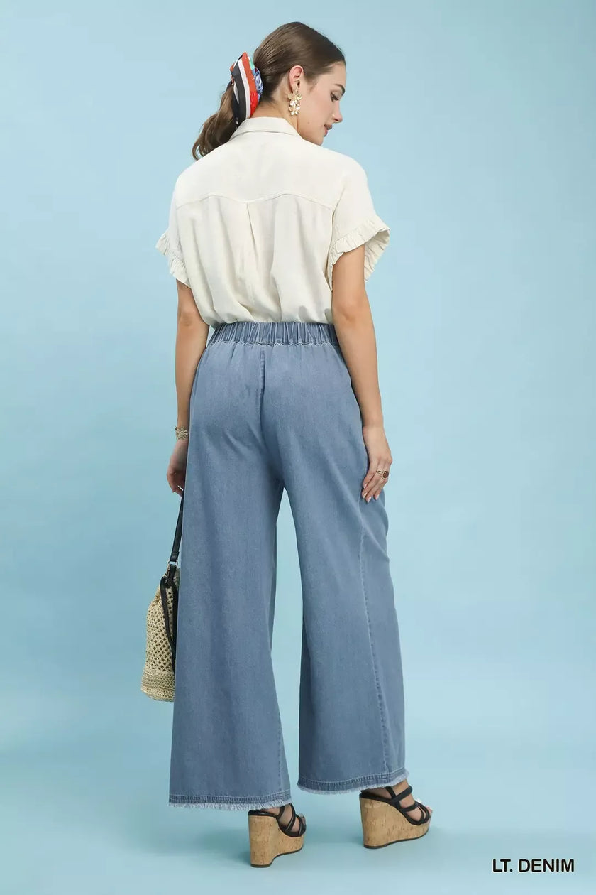 Light blue stone washed wide leg cotton pants with elastic waist and relaxed fit