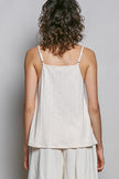 Textured knit camisole with lace V-neck trim in soft neutral colors and slim fit