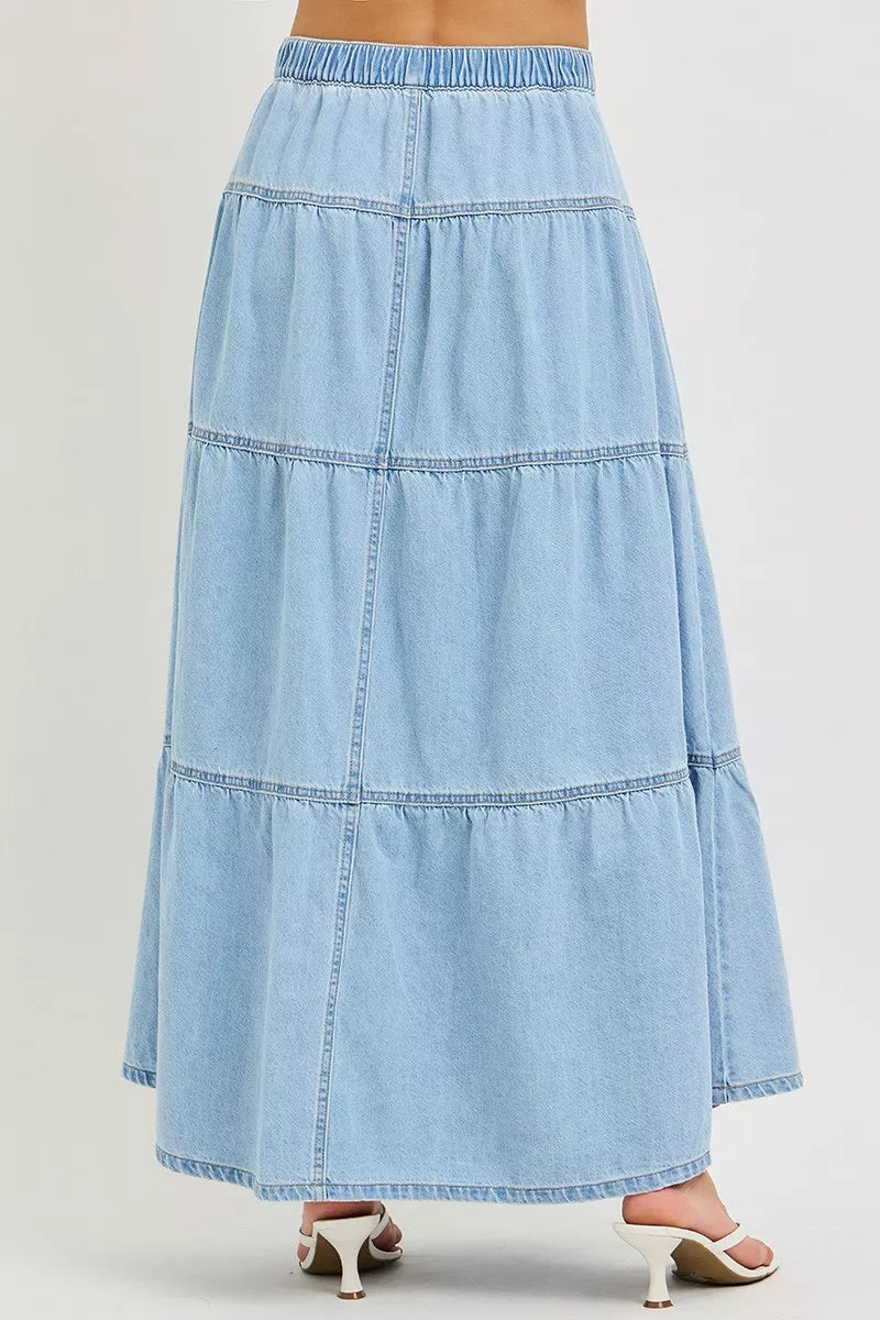 Light blue high-rise tiered denim maxi skirt with ruffle layers and elastic waistband