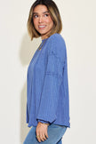 Front view of ribbed long sleeve tshirt on model