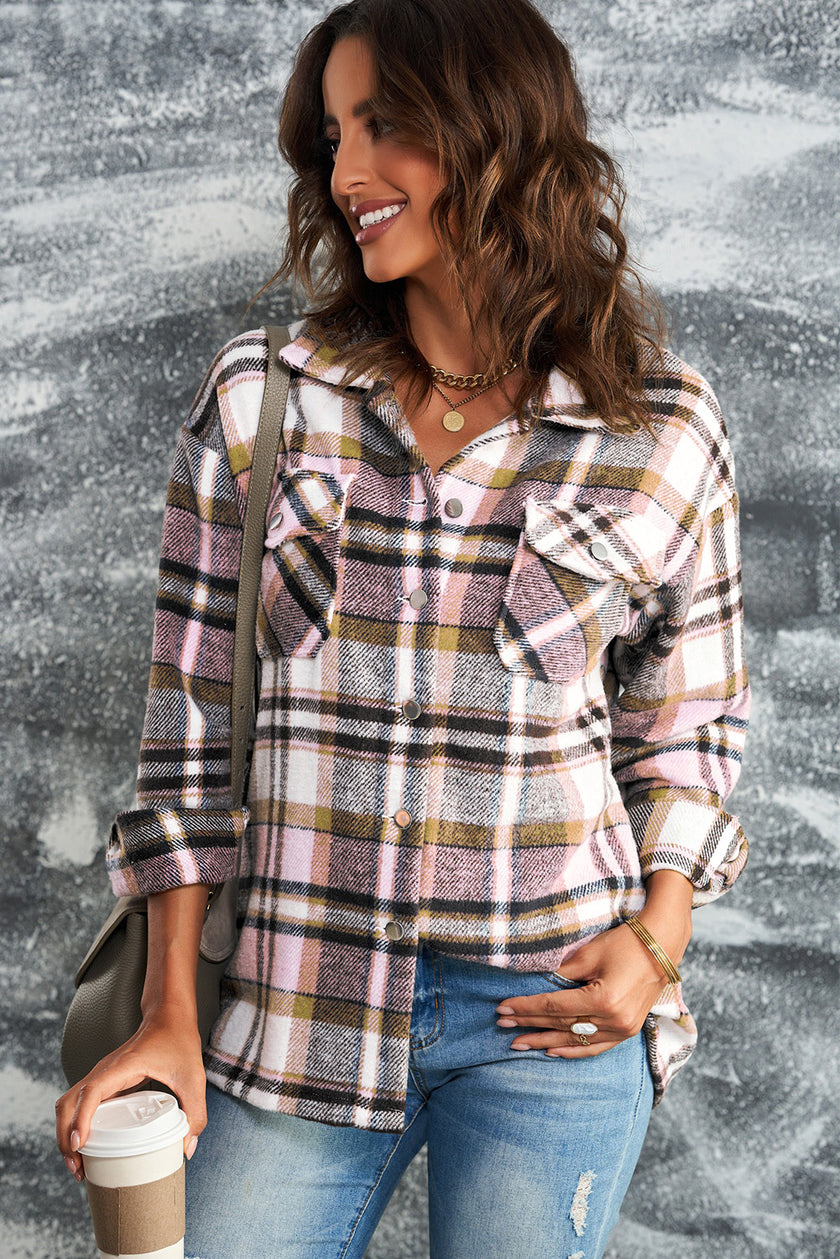 Red and black plaid shirt jacket with buttoned breast pockets and relaxed fit