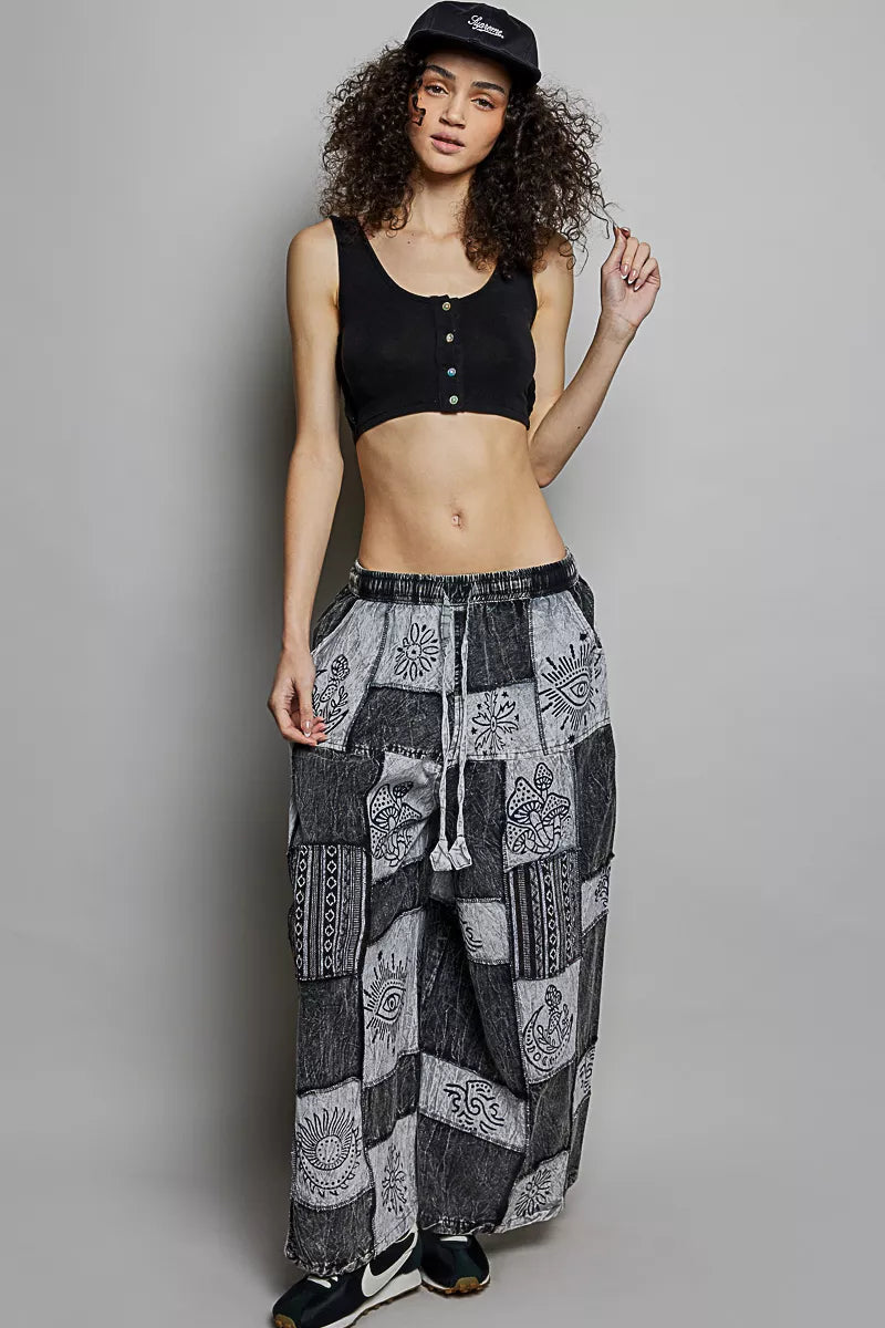 Grey and black patchwork wide leg drawstring pants with bohemian prints and pockets