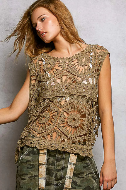Close-up of intricate lace crochet floral pattern on tank top