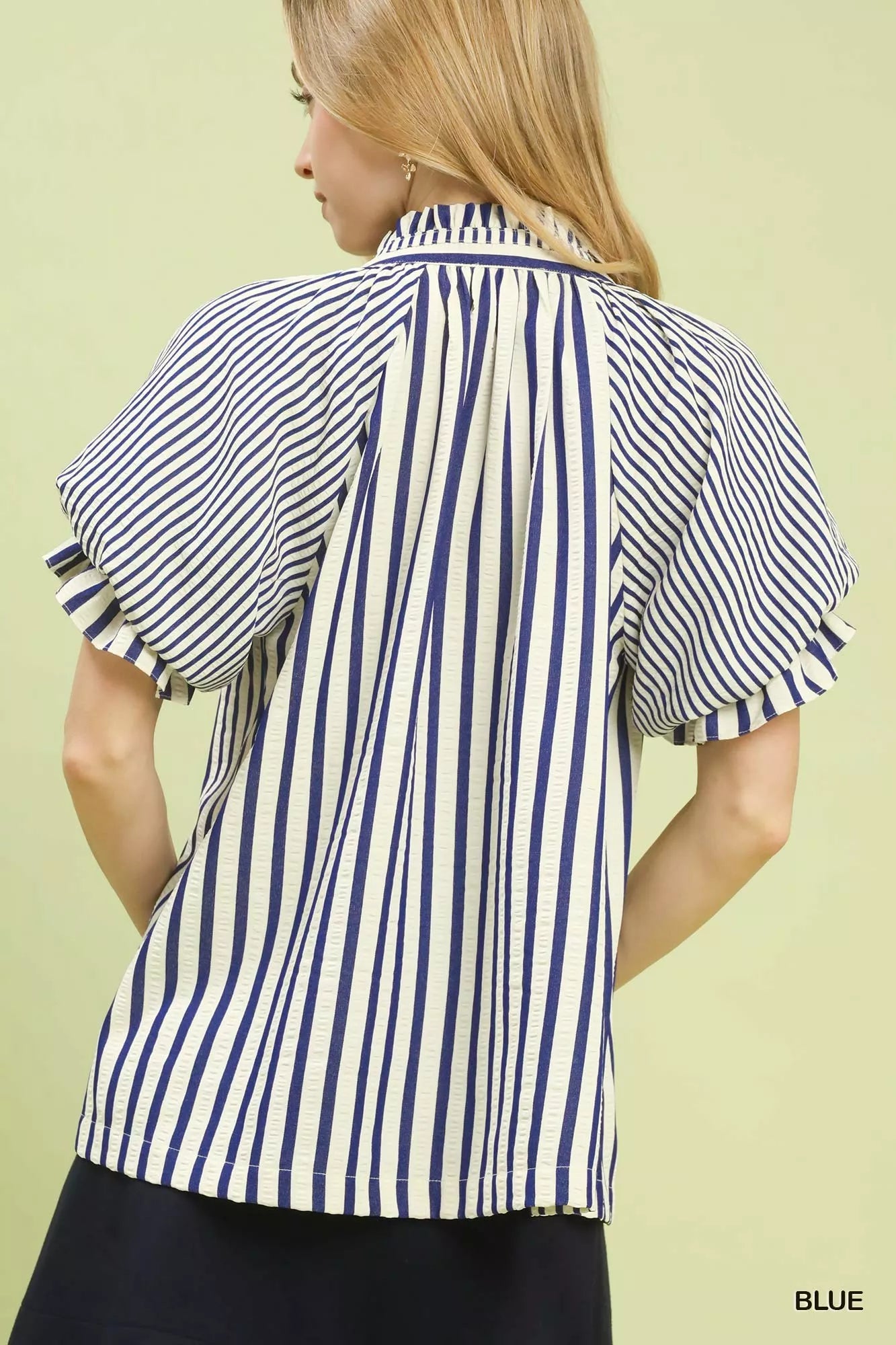 Striped top showcasing breathable unlined construction