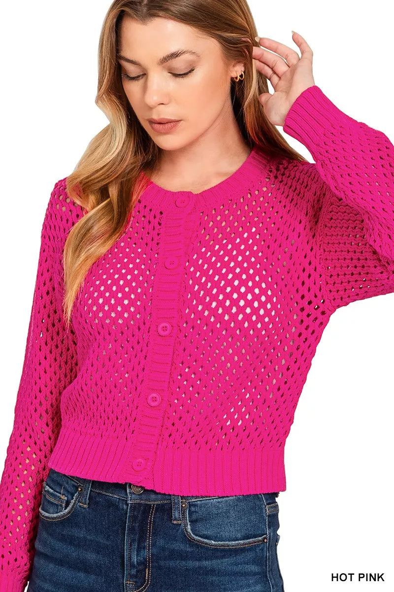 Close-up of lightweight cotton cardigan featuring intricate crochet stitching