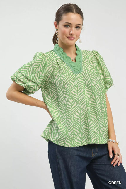 Viscose blouse featuring green leaf print and puff sleeves