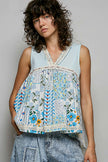 Light blue sheer v-neck tank top with floral print and white lace trim