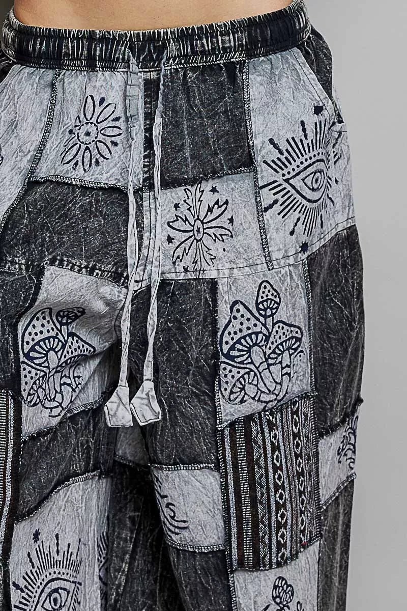 Grey and charcoal patchwork wide leg drawstring pants with bohemian mushroom and eye prints
