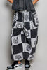Grey and black patchwork high-rise joggers with Aztec prints and drawstring waist fit