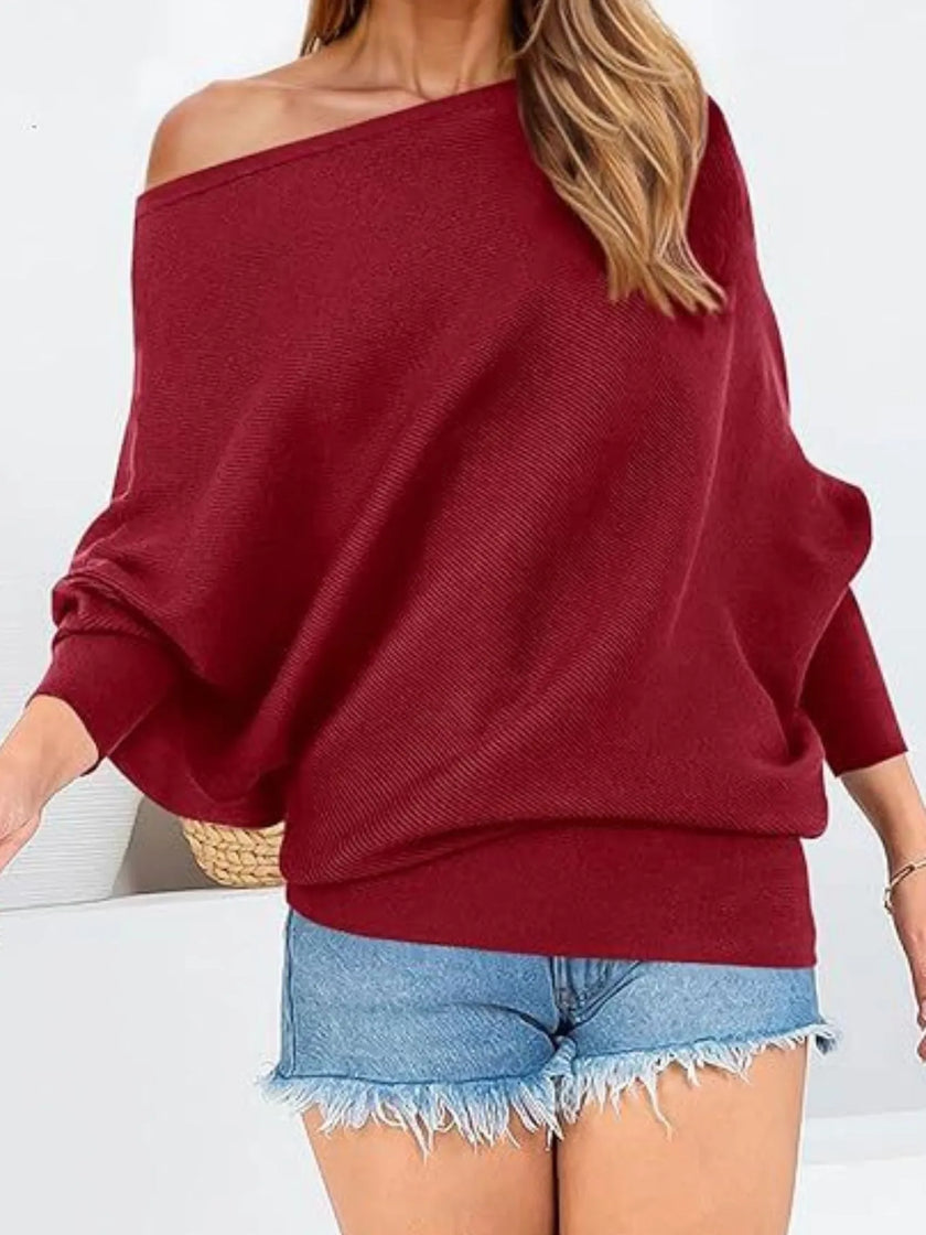 Ribbed knit top featuring off-shoulder neckline and oversized relaxed fit
