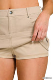 Beige cotton twill lined mini skirt with pockets and a slim fit design