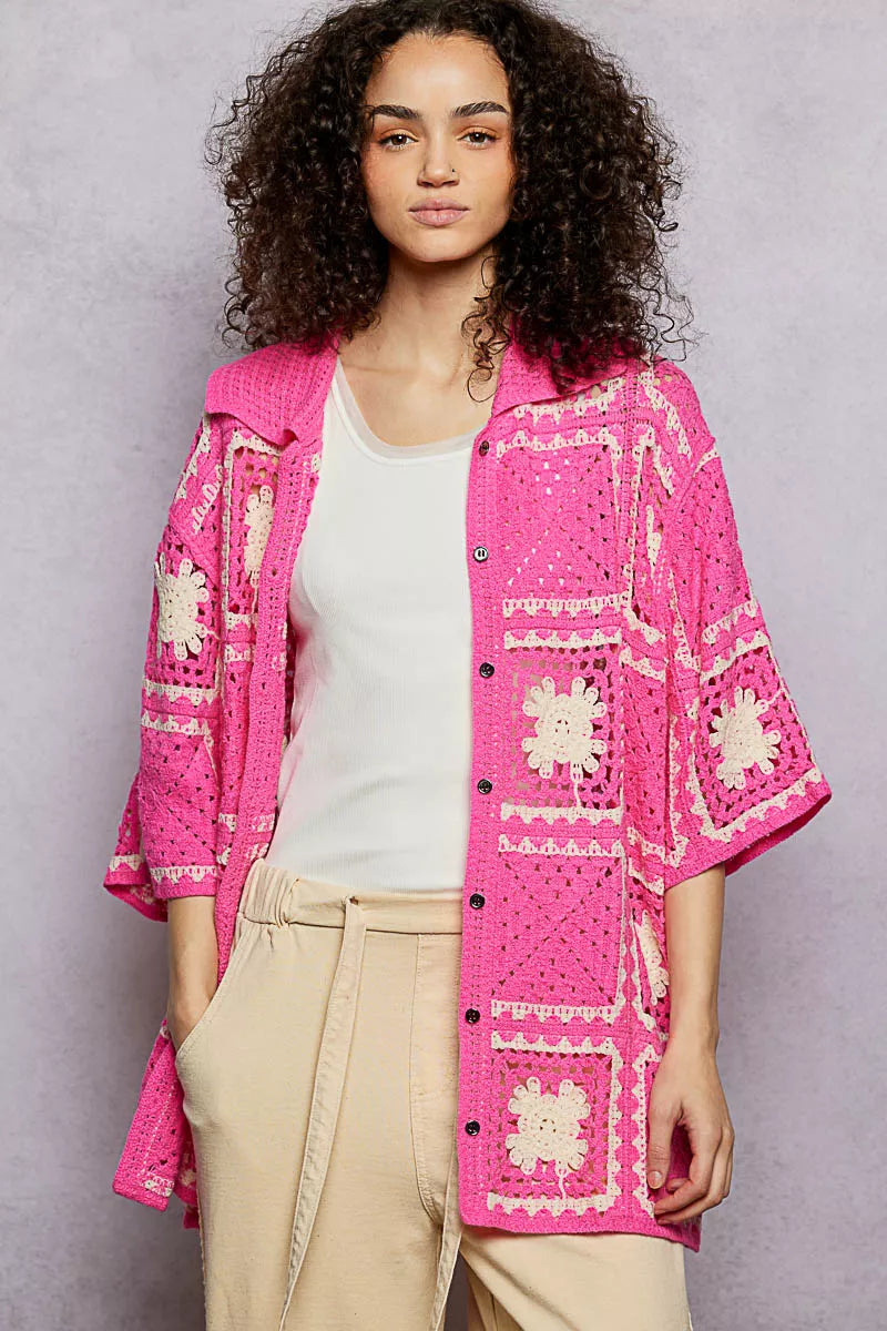 Crochet shirt featuring openwork floral granny square pattern with button closure