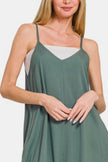 Wide-leg overalls in ash jade green displayed on model with relaxed fit